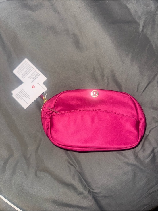 lululemon athletica Handbags - lululemon athletica Fuchsia Satin Cosmetic Pouch